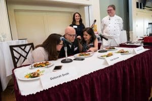 Judges discussing competing dishes