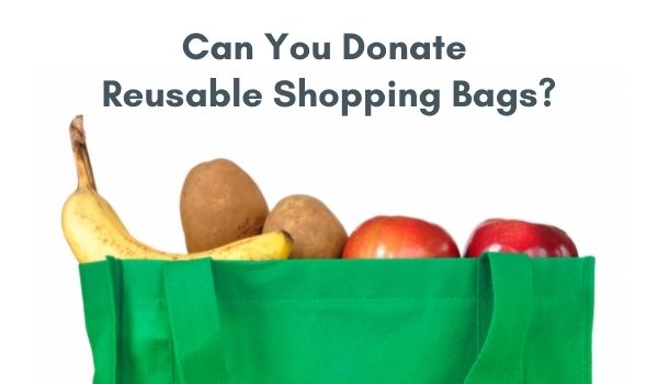 Reusable shopping bag full of bananas, potatoes and apples with text overlay "can you donate reusable shopping bags"