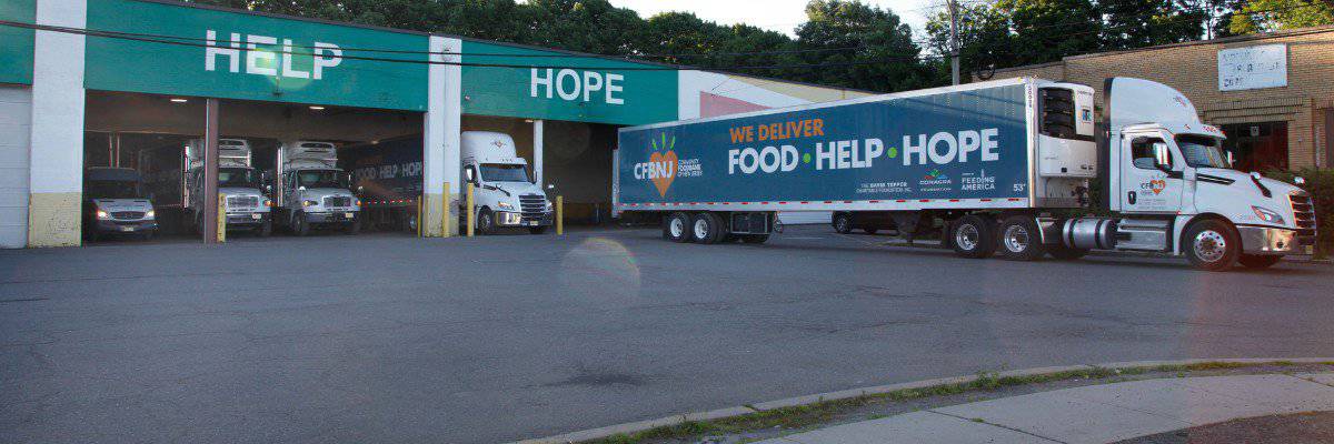 Truck backing into warehouse